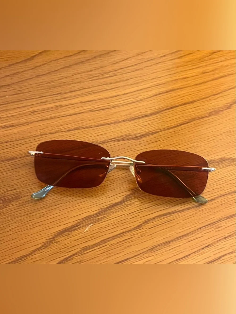 Rimless Gold-Frame Sunglasses with Brown Lenses